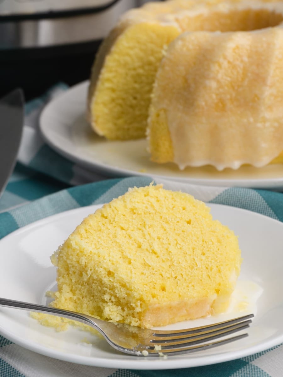 a large slice of lemon bundt cake on a plate