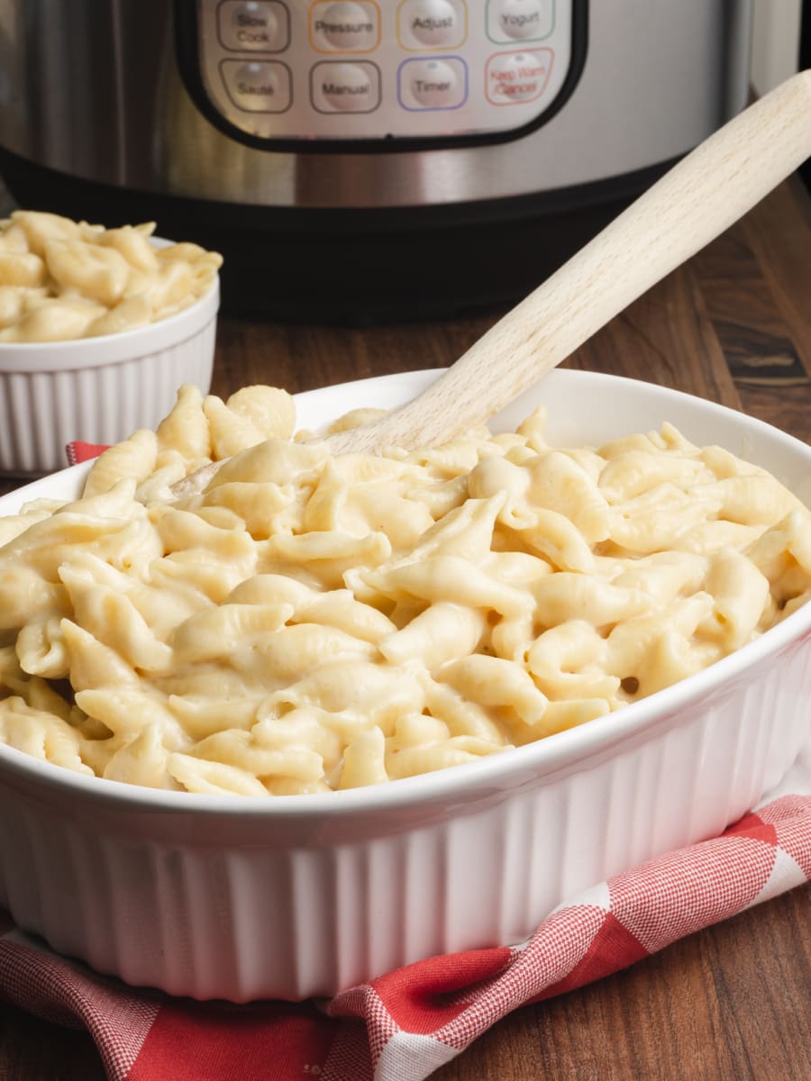 instant pot white cheddar shells and cheese with instant pot in the background