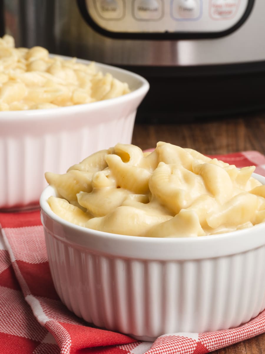 small bowl of creamy instant pot white cheddar mac and cheese