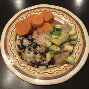 caribbean chicken thighs on a dinner plate