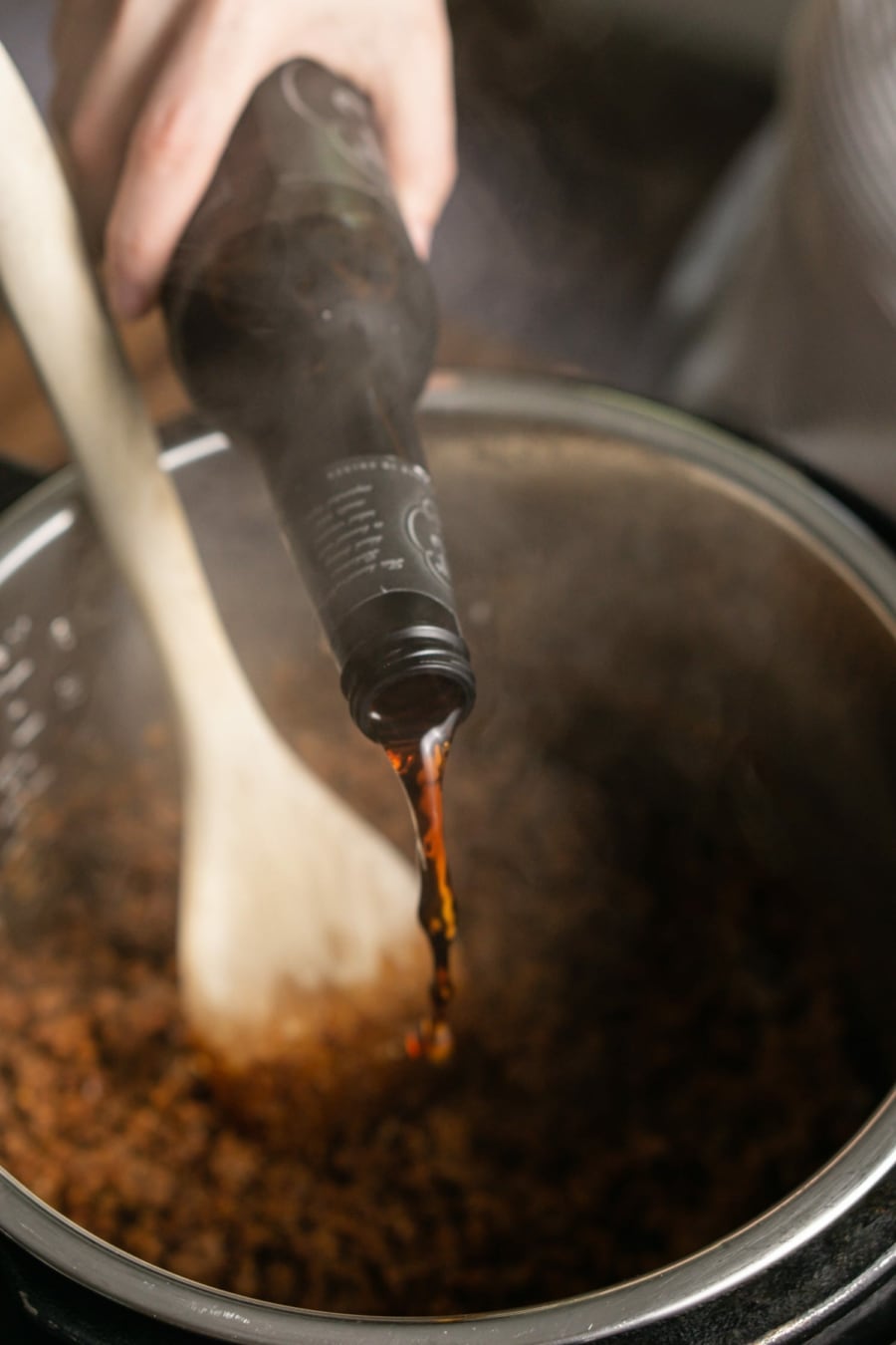 adding beer to the instant pot to make chili