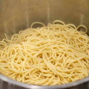 cooked spaghetti sitting in a large pot