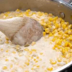 cooking creamed corn in a skillet