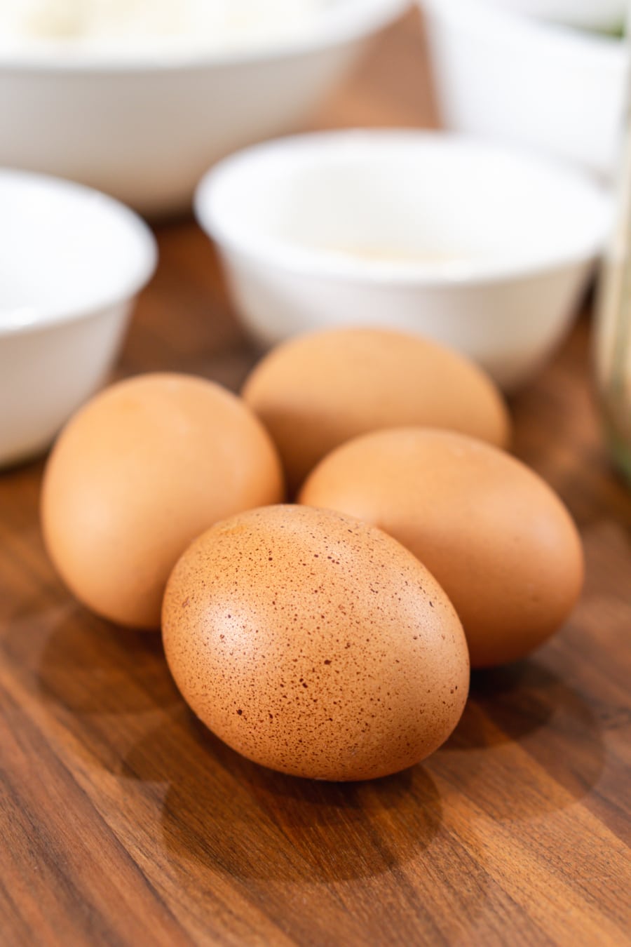 four eggs sitting on the counter