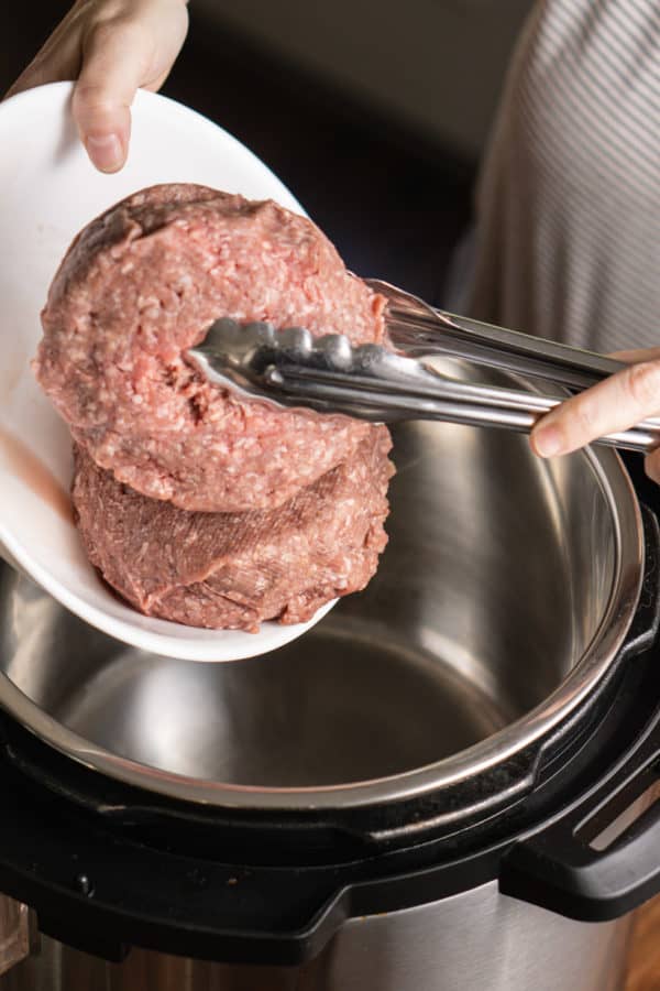 adding ground beef to the instant pot