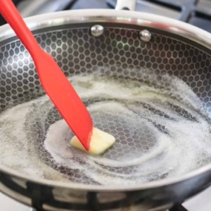 melting butter in a hot nonstick skillet