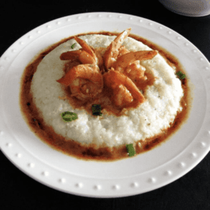 a bowl of shrimp and grits