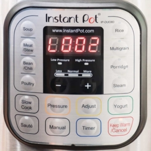 the digital display of the instant pot reading a two minute natural pressure release