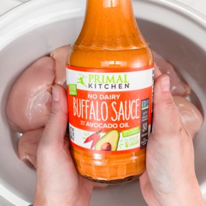 a bottle of primal kitchen buffalo sauce