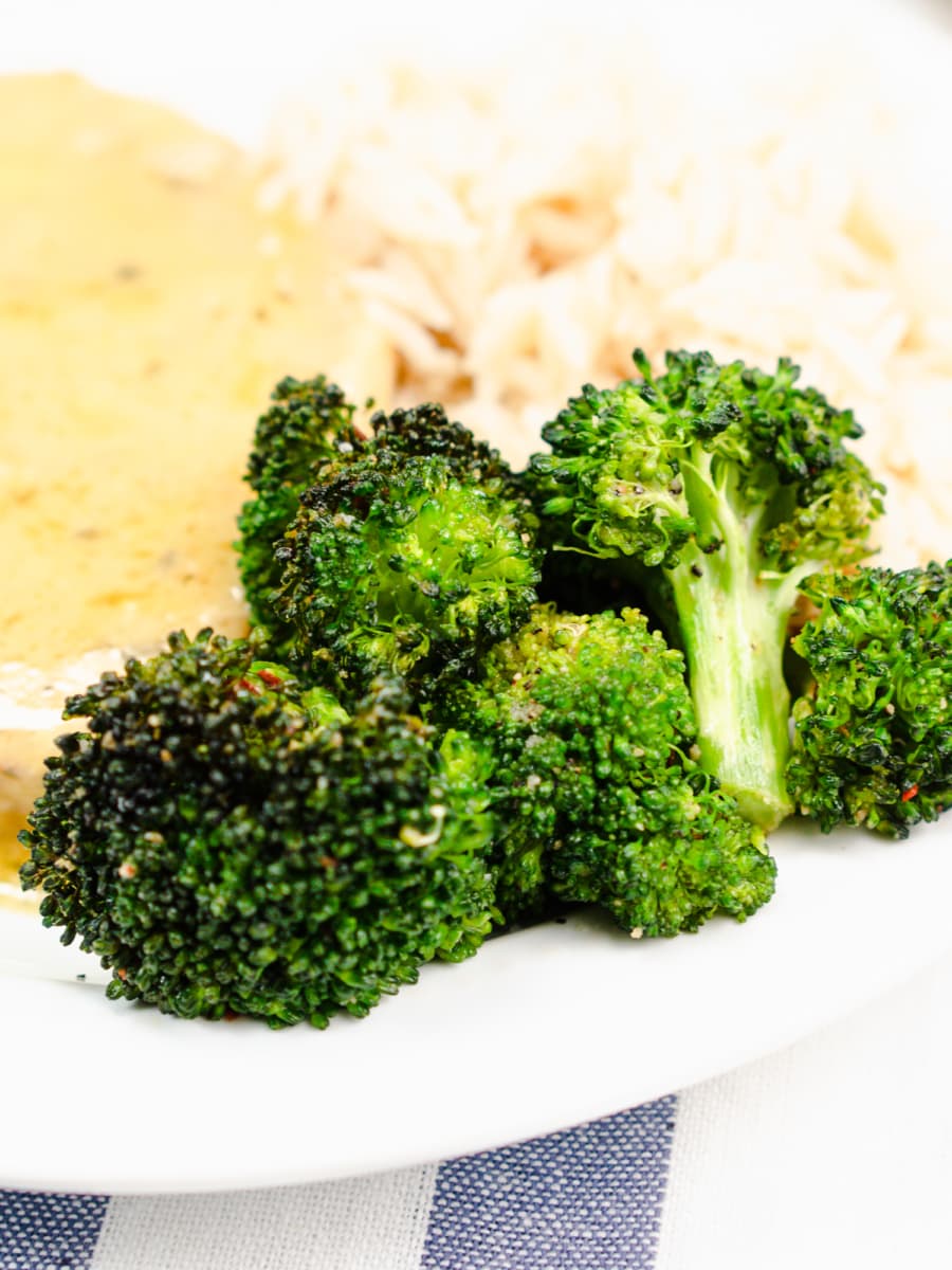 roasted broccoli served on a plate as a side dish