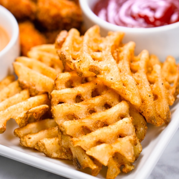 https://www.onehappyhousewife.com/wp-content/uploads/2022/05/air-fryer-waffle-fries-3-600x600.jpg