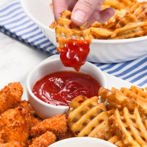 air fryer waffle fry dipped in ketchup