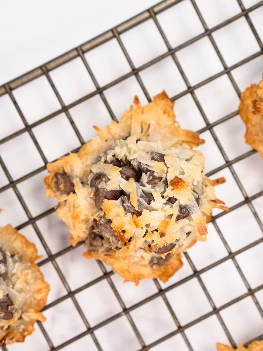 chocolate chip coconut macaroons cooling on a rack