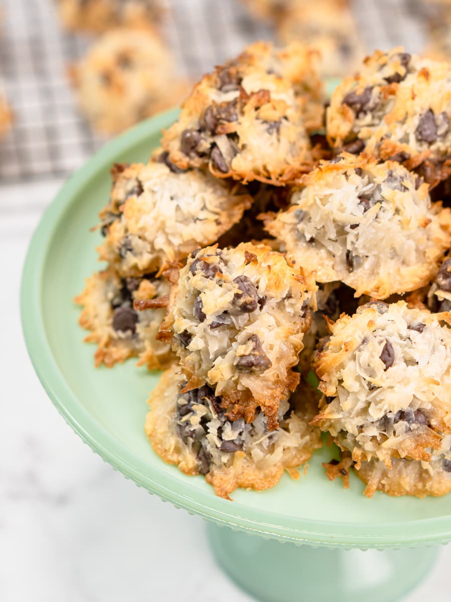 chocolate chip coconut macaroons served on a cake stand