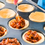 filling cornbread cups with sloppy joe filling