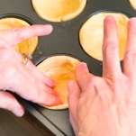 forming cups out of cornbread swirls