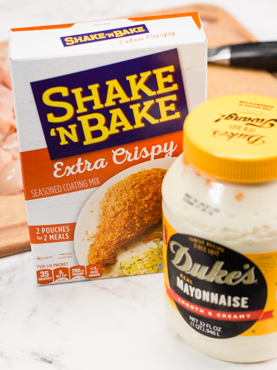 ingredients for air fryer chicken nuggets including cubed chicken, shake-n-bake, and mayonnaise