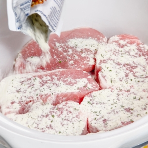 seasoning pork chops in the slow cooker with a packet of ranch seasoning