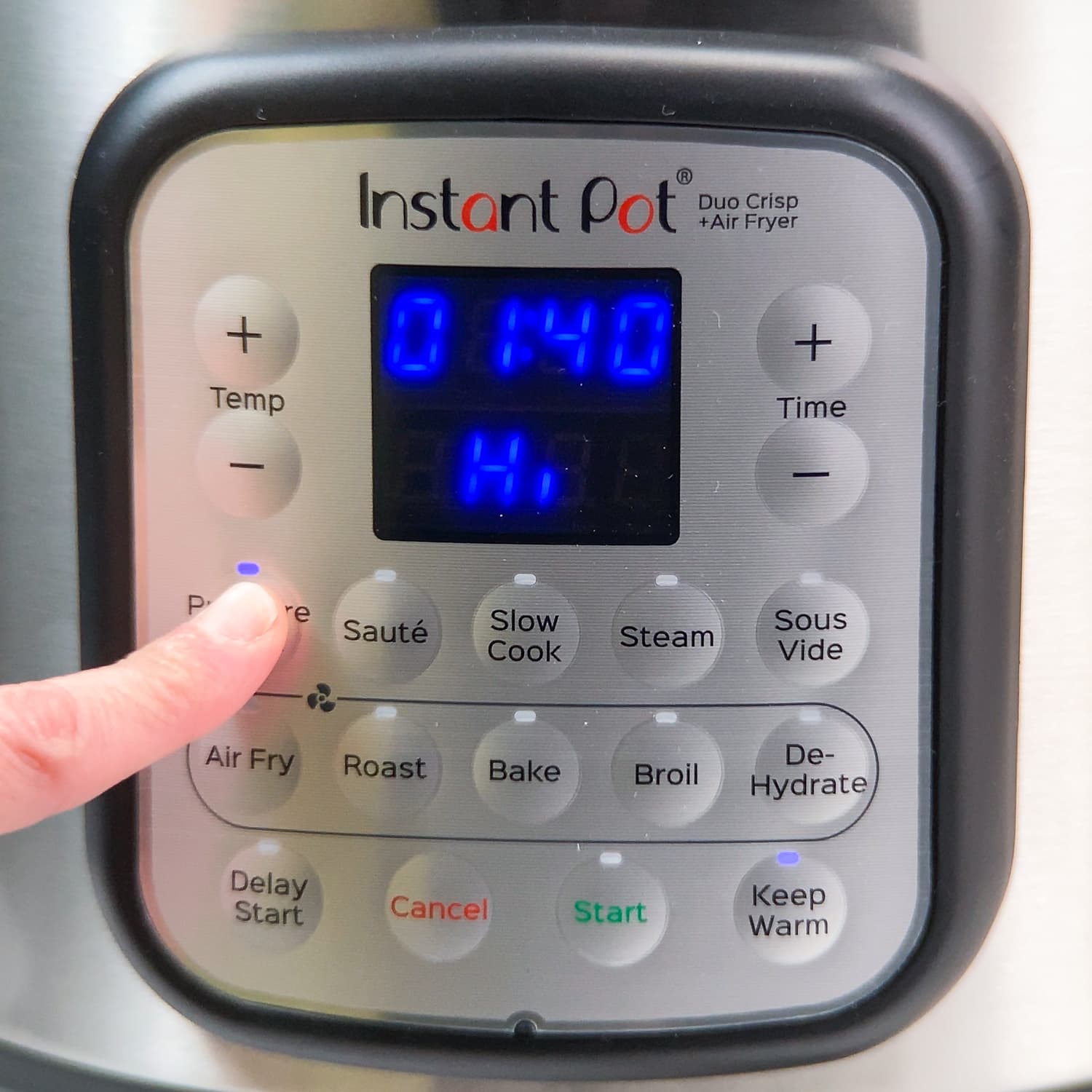 setting the instant pot to cook on high for an hour and forty minutes