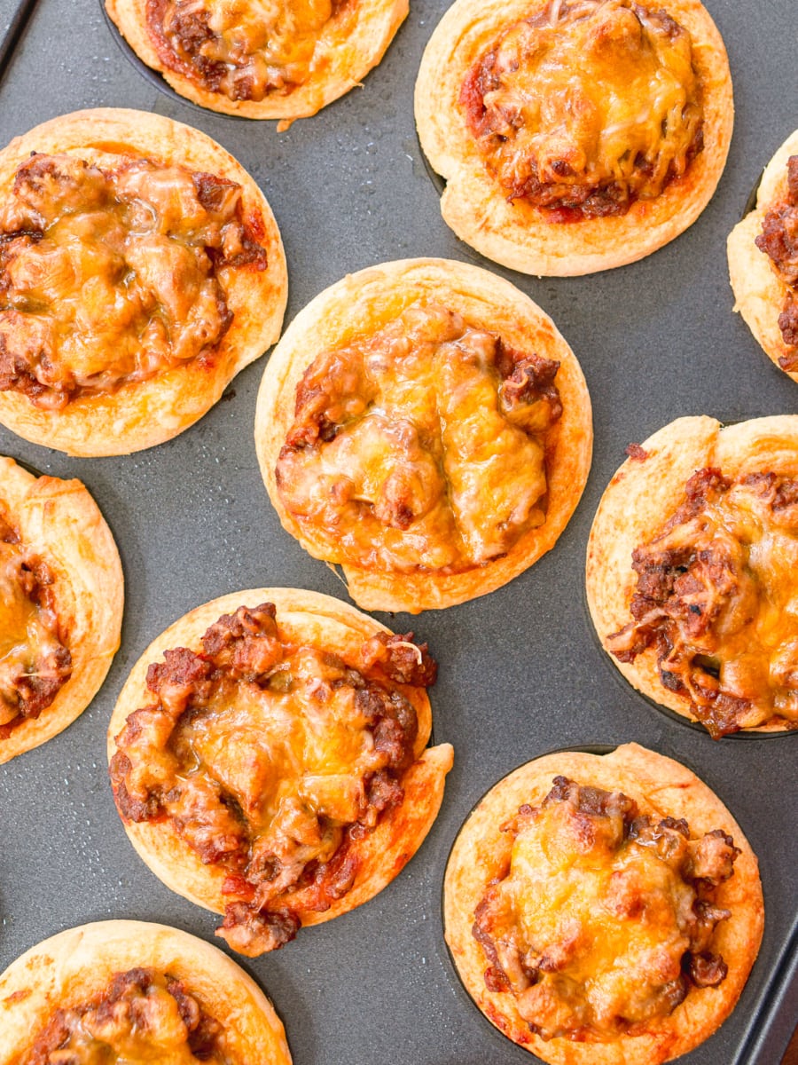 sloppy joe cornbread cups in a baking pan after cooking