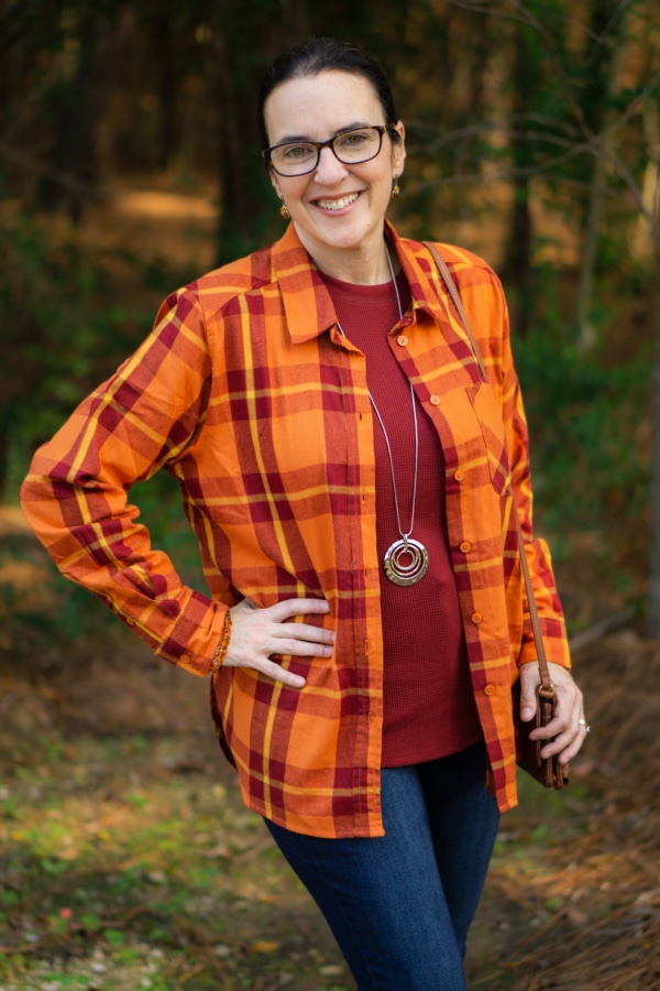 valerie posing in winter clothing in the woods