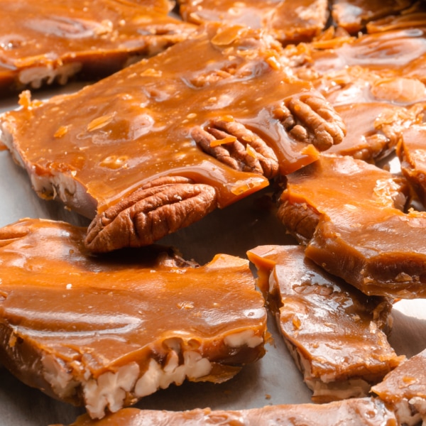 close up of pecan toffee on a tray