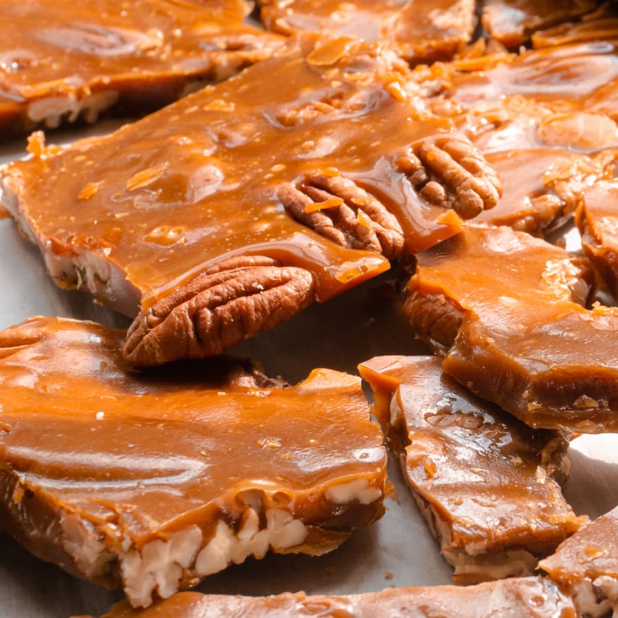 close up of pecan toffee on a tray