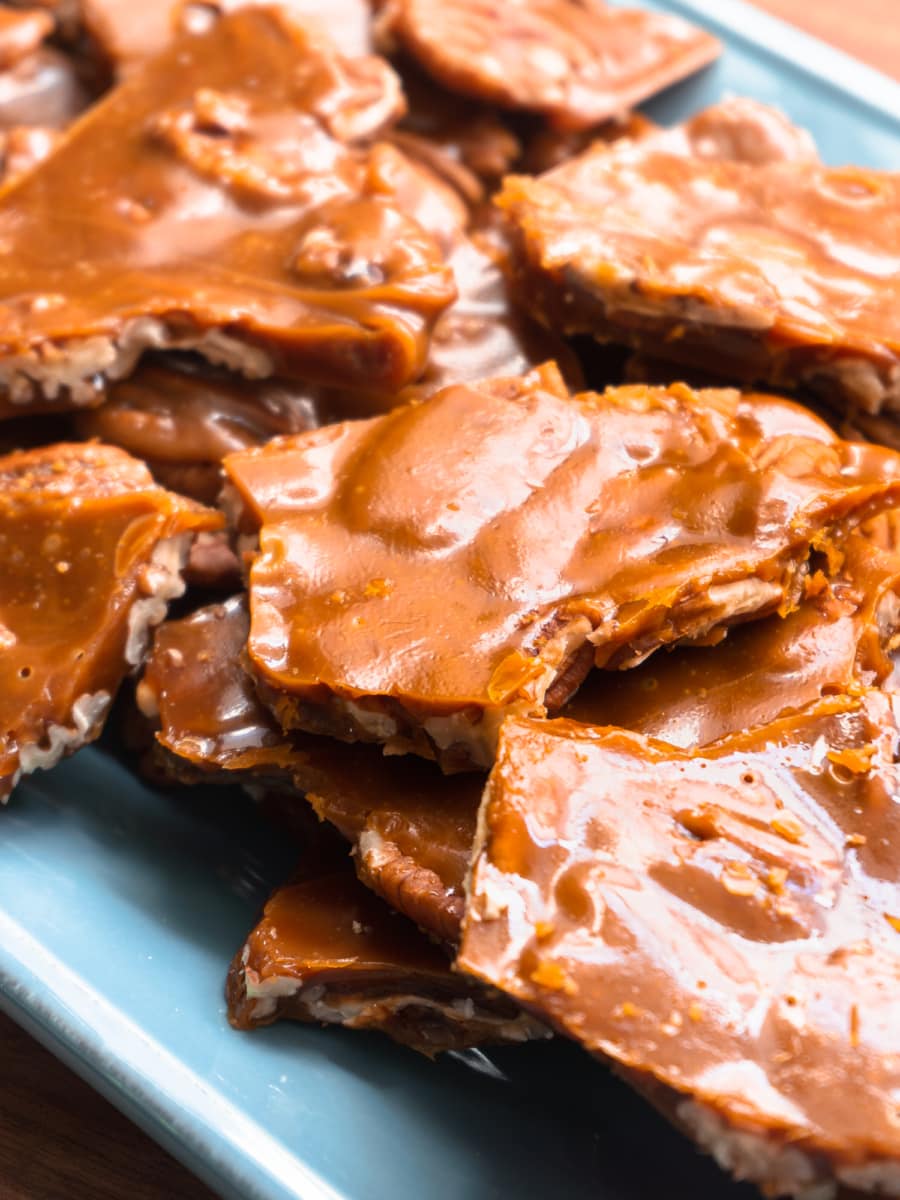 buttery southern pecan toffee pieces on a plate