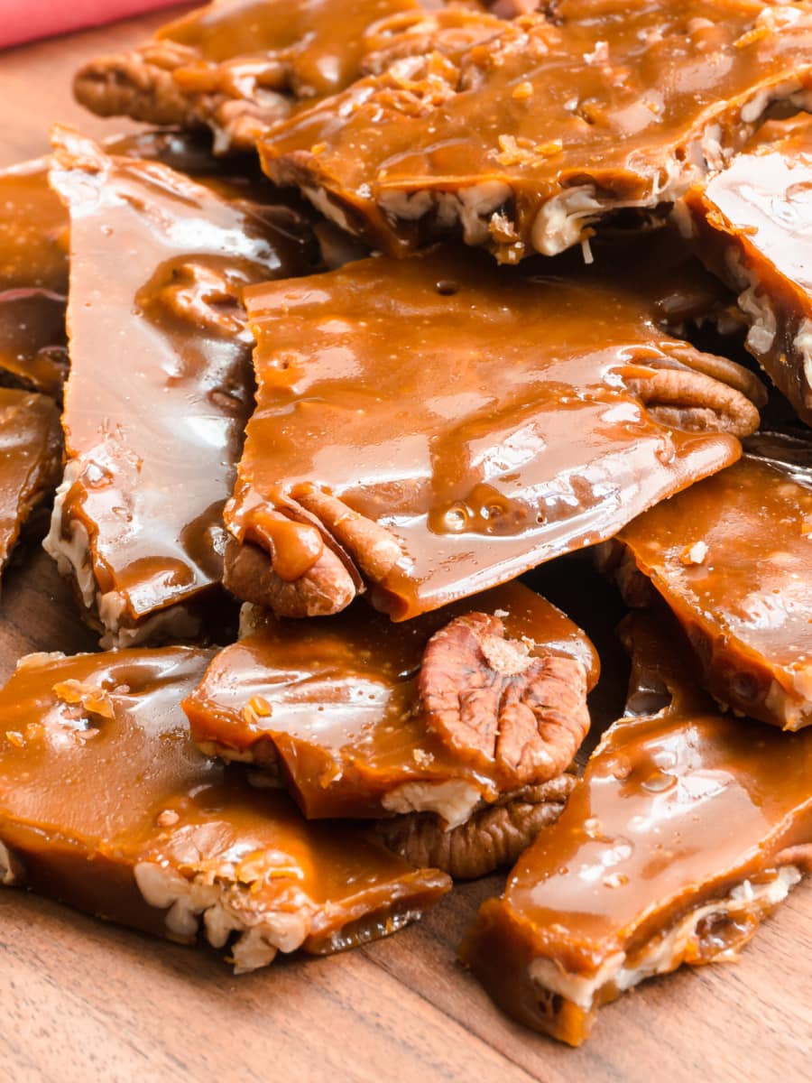 southern pecan toffee pieces laying a checkered towel