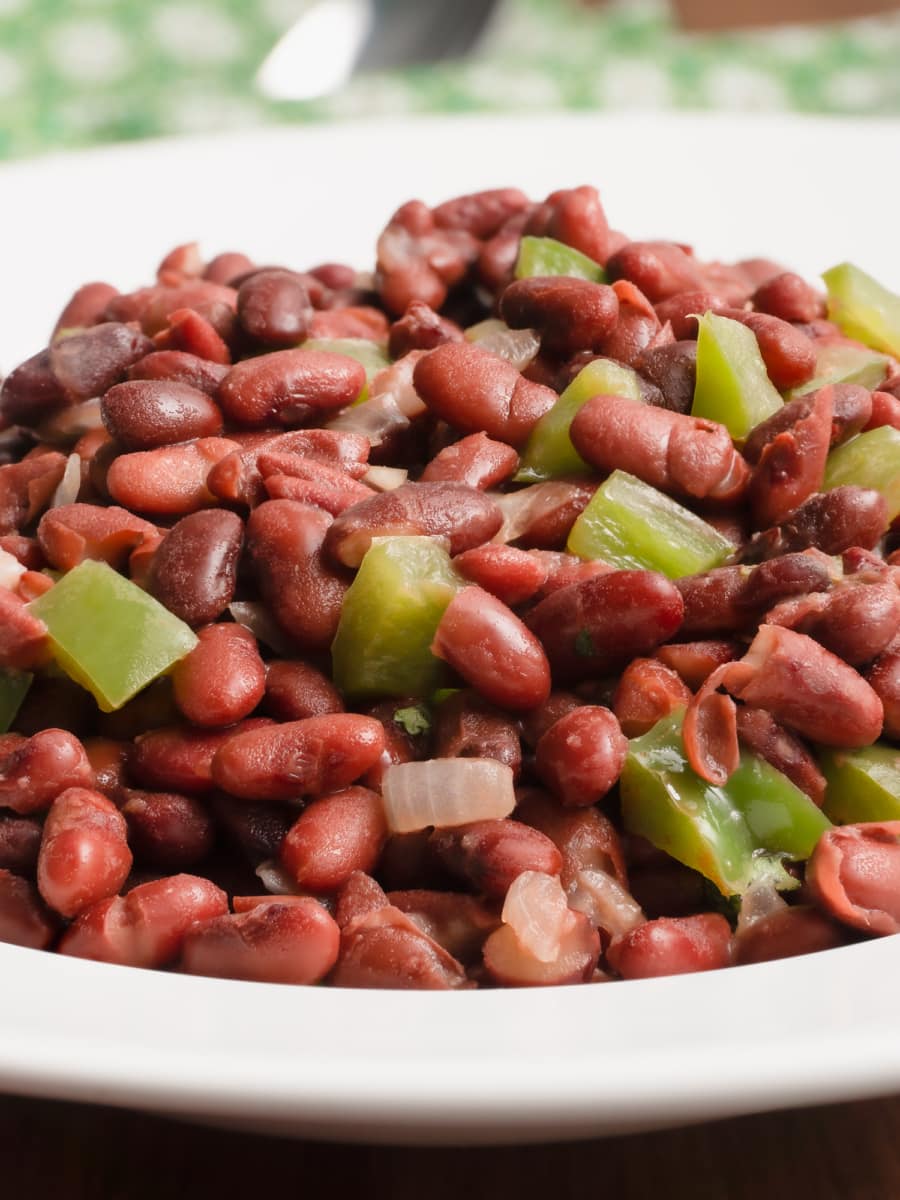 stewed red beans in a large bowl close up