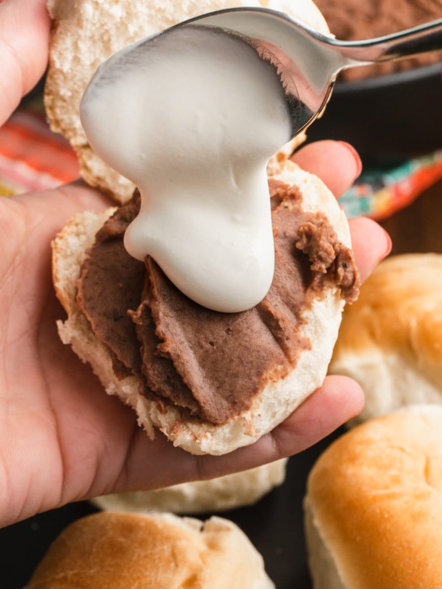 pan con frijoles or bread and beans with mantequilla drizzled on top