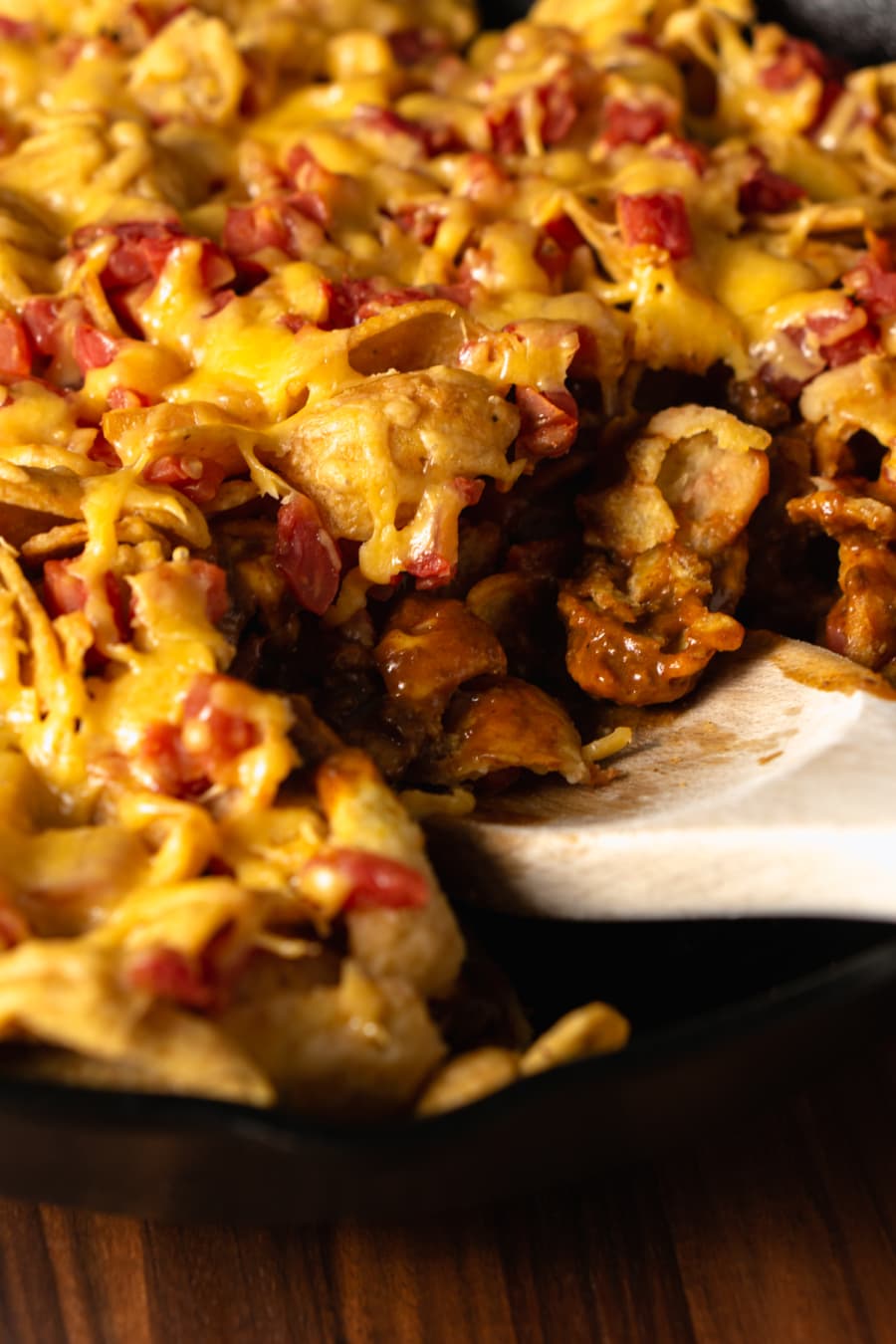 a skillet of baked frito pie casserole