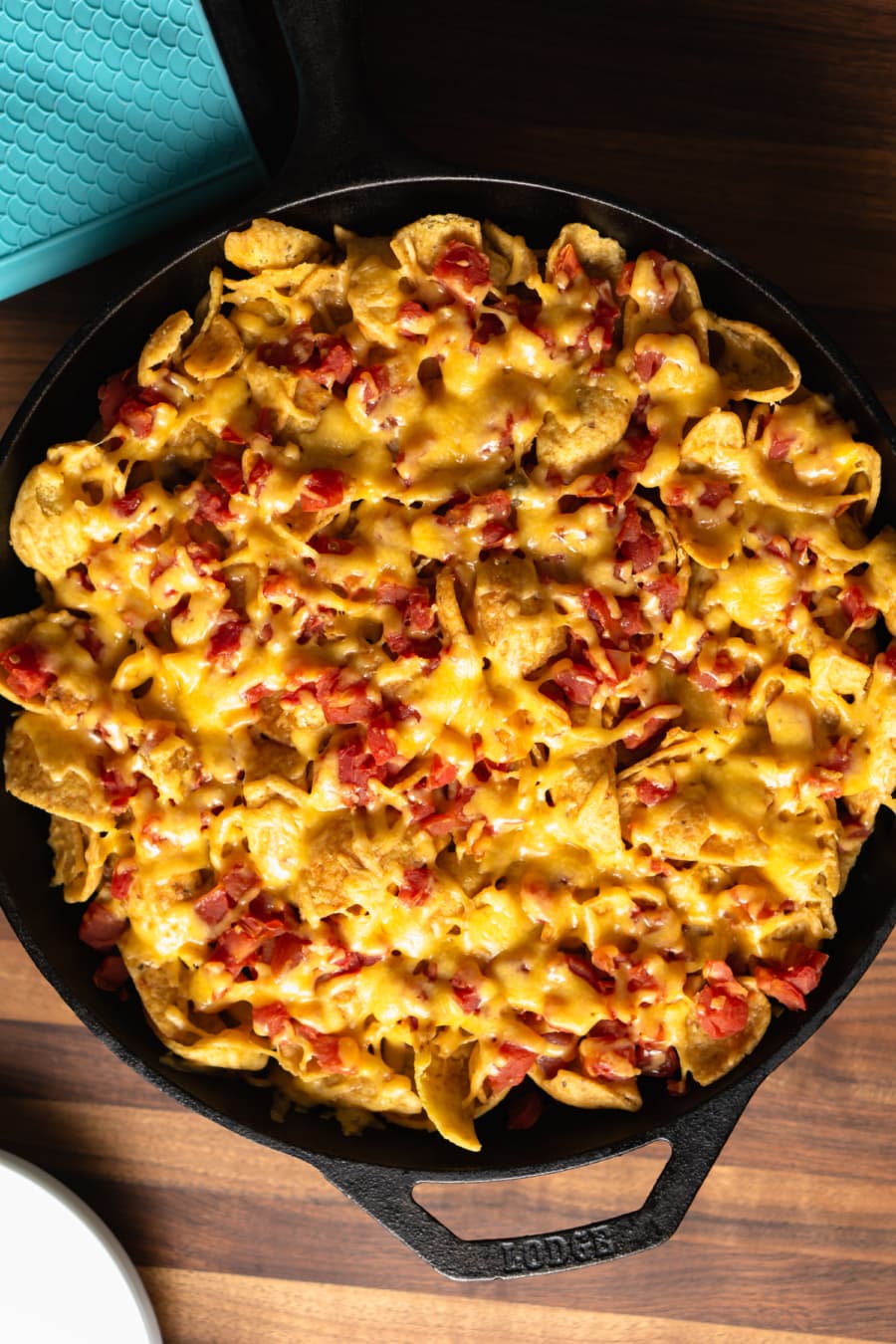 easy baked frito pie made in a cast iron skillet